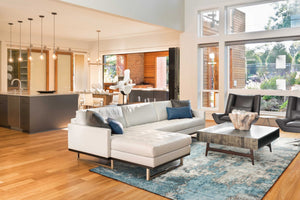 HomeRoots 7' Ivory and Teal Abstract Area Rug - Modern Elegance for Stylish Living Spaces, Kid & Pet Friendly 7' X 9' 375596