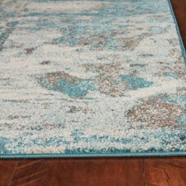 HomeRoots 8' Abstract Watercolor Indoor Area Rug - Soft Ivory and Teal Design for Modern Living Spaces 8' X 10' 375597