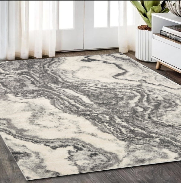 HomeRoots 5' Gray and Ivory Abstract Area Rug - Modern Design for Style, Comfort, and Noise Reduction in Any Room 5' X 8' 375603
