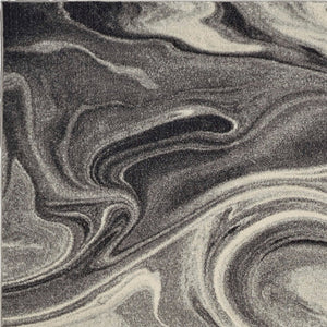 HomeRoots 7' Abstract Shag Area Rug in Ivory, Black, and Gray - Modern Comfort for High-Traffic Spaces 7' X 9' 375612