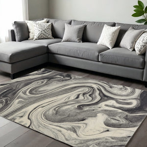 HomeRoots 7' Abstract Shag Area Rug in Ivory, Black, and Gray - Modern Comfort for High-Traffic Spaces 7' X 9' 375612