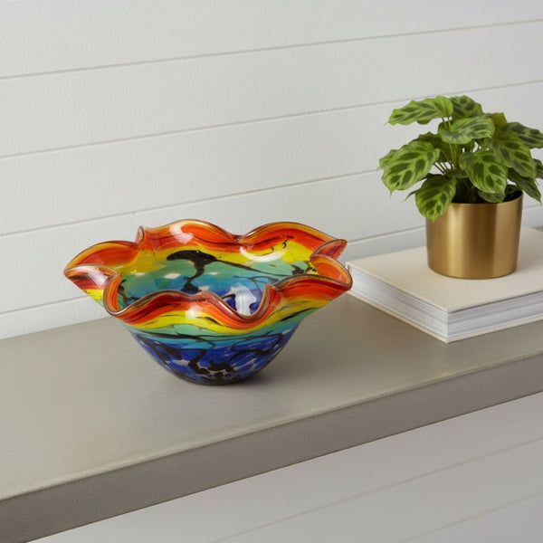 HomeRoots 9" Rainbow Art Glass Centerpiece Bowl - Hand-Blown Murano Style with Wavy Rim & Vibrant Colors 375793