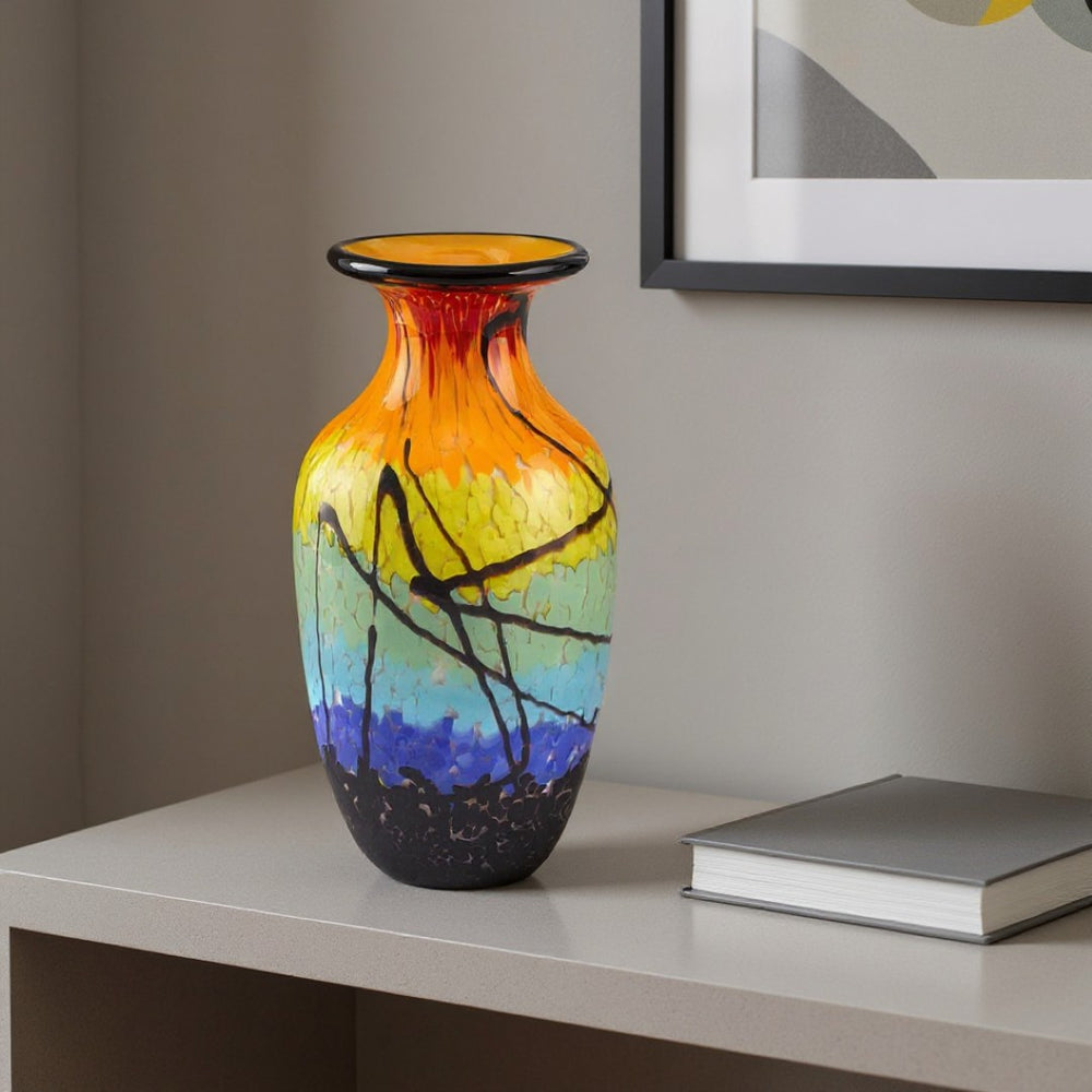 HomeRoots 11" Handblown Glass Urn Vase in Bold Black, Blue, Red & Yellow - Modern Abstract Decor Piece 375794