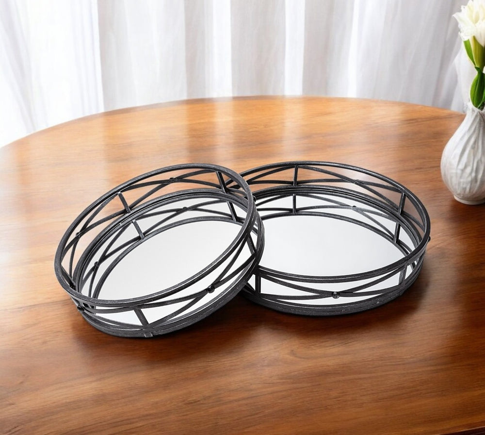HomeRoots Set of Two Elegant Black Round Metal and Mirrored Glass Vanity Trays for Home Decor and Organization 376025