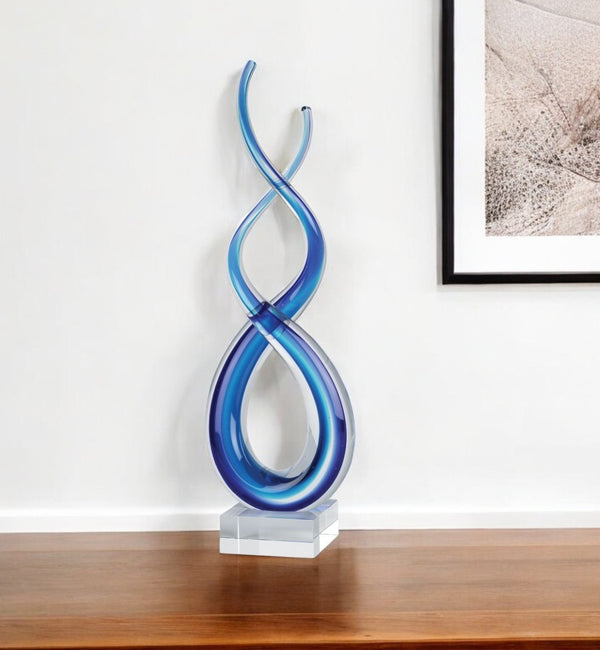 HomeRoots 14" Murano Glass Modern Abstract Tabletop Sculpture - Handcrafted Blue & Clear Artistry for Home Décor 376068