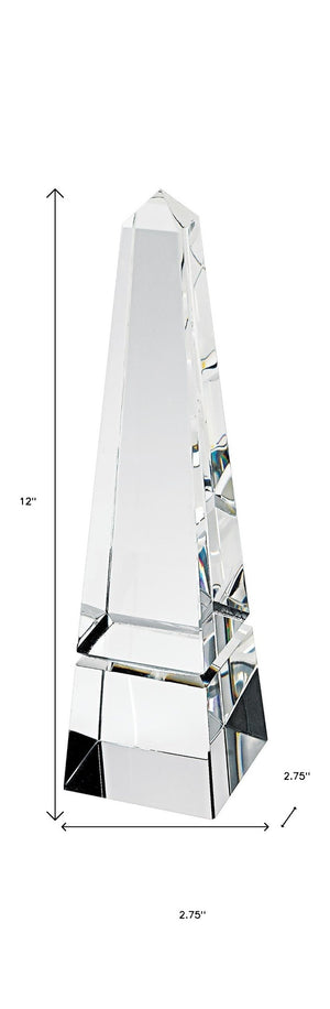 HomeRoots 12" Clear Crystal Obelisk Statue - Handcrafted Optical Crystal Décor for Modern Elegance & Gifts 376090