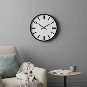 HomeRoots 24" Round Large Modern Wall Clock: Sleek Scandinavian Design with Matte Black Frame & Wood Markers 376248