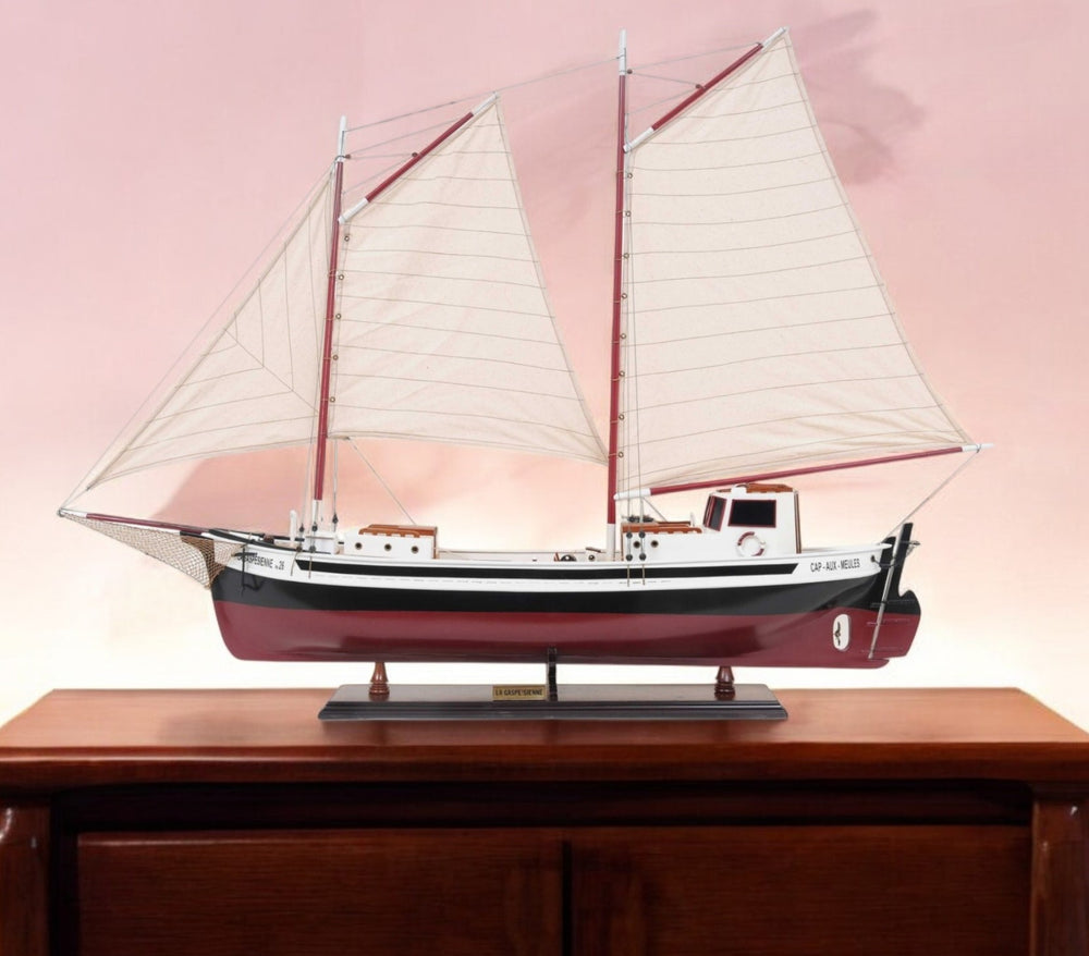 Homeroots 31" Black And White Solid Wood Hand Painted Model Boat Tabletop Sculpture  Solid Wood 376348