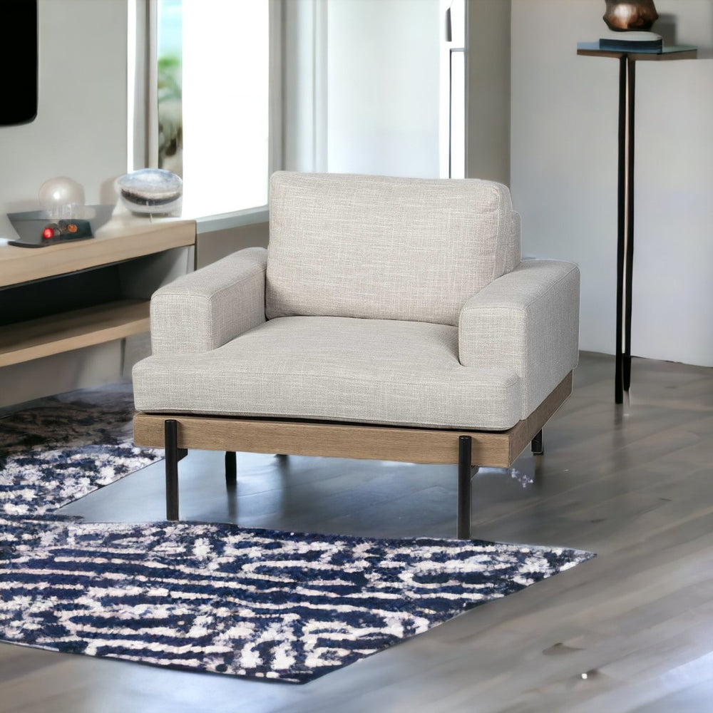 HomeRoots 41" Cream and Black Fabric Arm Chair - Modern Comfort with Stylish Design for Any Living Space 376362