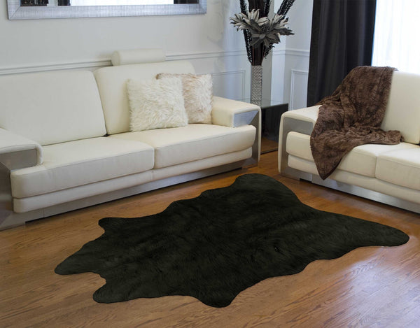 Homeroots 5' X 7' Black Faux Cowhide Area Rug  Acrylic 376625