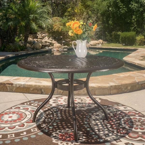 English Elm Christopher Knight Home® - PHOENIX Cast Aluminum 48in Round Patio Dining Table with Lattice Scrollwork and Umbrella Hole Bronze 49.25 L x 49.25 W x 5.25 H 54588.00BZE