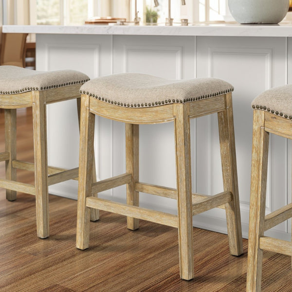 HomeRoots 26" Cream Saddle Stool with Solid Wood Frame | Rustic Backless Bar Chair for Modern Farmhouse Style 380057
