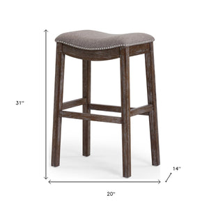 HomeRoots 31" Taupe Upholstered Backless Bar Chair with Brown Solid Wood Base for Modern Farmhouse Style 380067