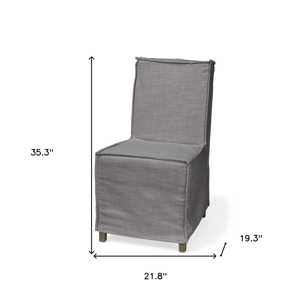 HomeRoots Set of Two Stylish Gray Slipcovered Parsons Chairs with Brown Wood Legs for Modern Spaces 380404