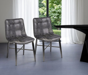 HomeRoots Black Upholstered Leather Dining Side Chair - Modern Industrial Design, Comfort & Versatility for Any Space 380423