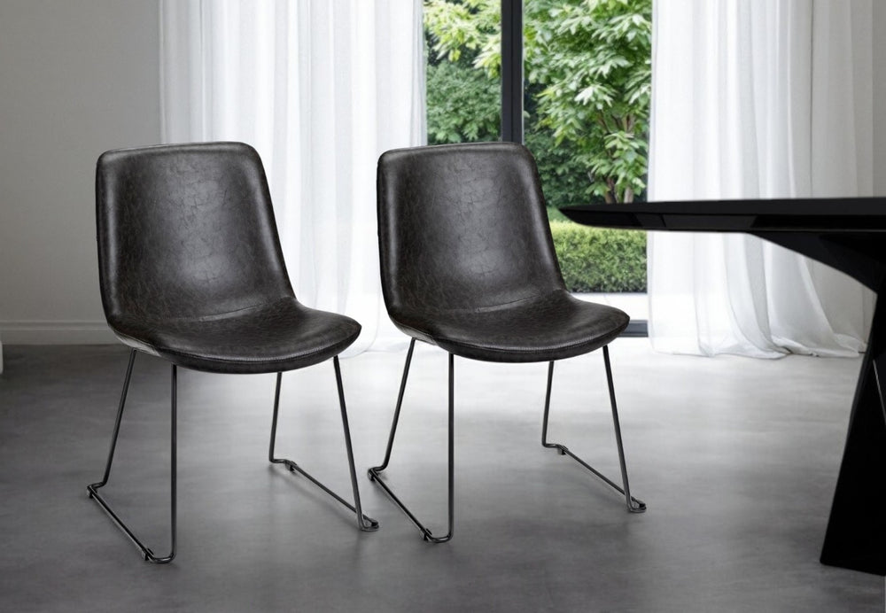 HomeRoots Set of Two Elegant Black Upholstered Faux Leather Side Chairs for Stylish Dining & Living Spaces 380429