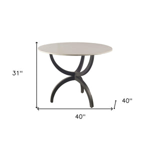 Homeroots 40" Off White And Black Rounded Marble And Metal Three Leg Base Dining Table   380458