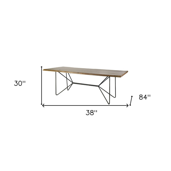 Homeroots 84" Natural And Black Solid Wood And Metal Trestle Base Dining Table   380464