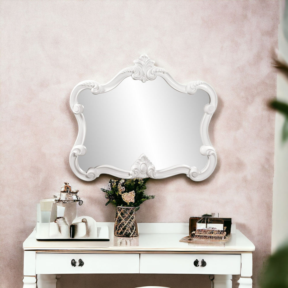 Homeroots 28" White Baroque Framed Accent Mirror  Polyurethane Foam 383716