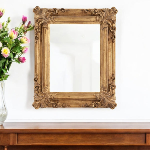 HomeRoots 23" Antiqued Gold Ornate Scroll Accent Mirror - Elegant, Ready-to-Hang, Ideal for Any Room Decor 383719