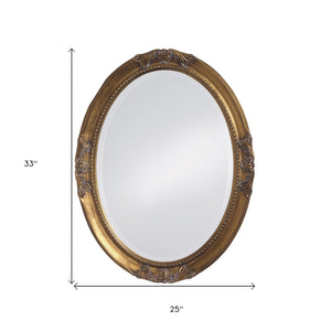 Homeroots 33" Gold Oval Framed Accent Mirror  Wood 383720