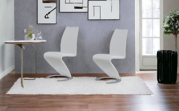 Homeroots Set Of Two White And Silver Upholstered Faux Leather Dining Parsons Chairs  Wood 383955