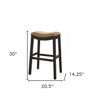 Homeroots 31" Tan And Espresso Faux Leather And Solid Wood Backless Counter Height Bar Chair   384135