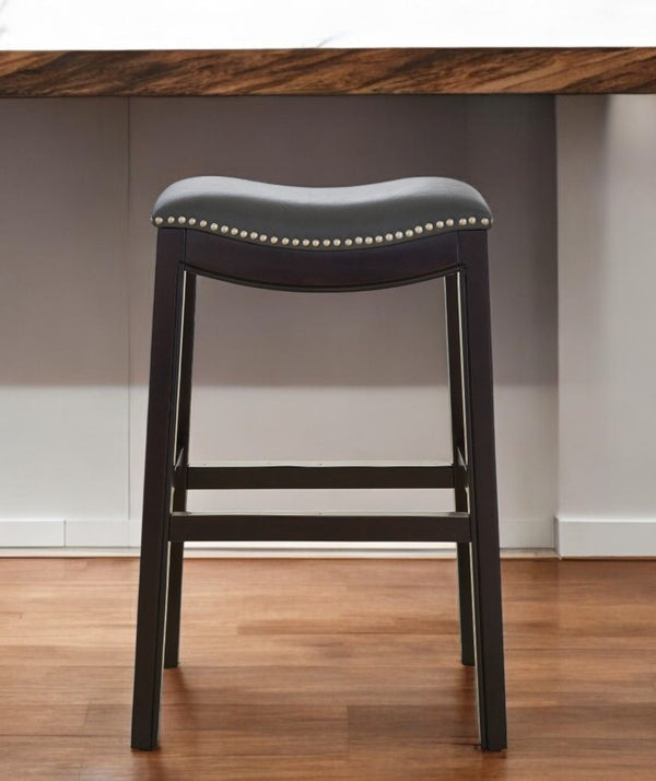 HomeRoots 31" Stylish Gray Faux Leather Backless Bar Chair with Espresso Wood Frame for Modern Spaces 384137