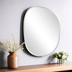 HomeRoots 24" Abstract Oval Accent Mirror - Frameless Design for Modern Elegance in Any Room Decor, Ready to Hang 384178