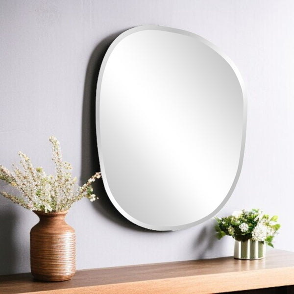 HomeRoots 24" Abstract Oval Accent Mirror - Frameless Design for Modern Elegance in Any Room Decor, Ready to Hang 384178