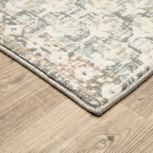 HomeRoots 10' Elegant Distressed Area Rug with Timeless Medallion Design for Modern and Traditional Spaces Ivory/ Grey 9'10" x 12'10" 384272