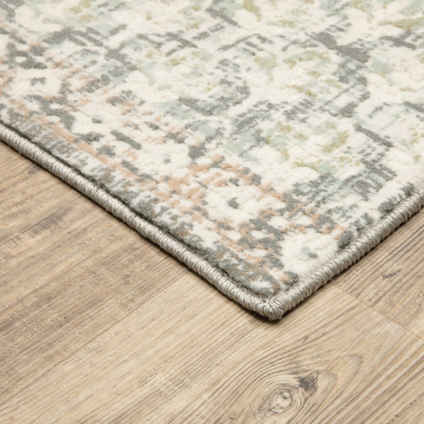 HomeRoots 10' Elegant Distressed Area Rug with Timeless Medallion Design for Modern and Traditional Spaces Ivory/ Grey 9'10" x 12'10" 384272