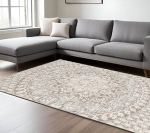 HomeRoots 10' Elegant Distressed Area Rug with Timeless Medallion Design for Modern and Traditional Spaces Ivory/ Grey 9'10" x 12'10" 384272