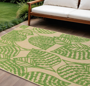 HomeRoots 5' Green Floral Indoor Outdoor Area Rug - Durable, Easy-Care Design for Patios, Kitchens & More! 6'7" x 9'6" 384345