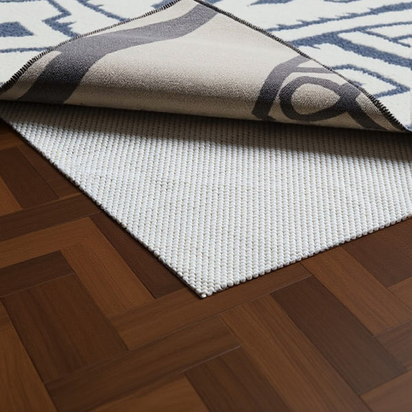 HomeRoots 10' Non-Slip Rug Pad - Durable Beige Cushion for Hard Floors, Enhances Comfort & Protects Rugs 9'6" x 13'4" 384357