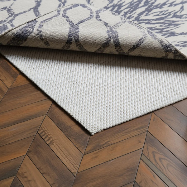 HomeRoots 10' Non-Slip Rug Pad - Durable Beige Cushion for Hard Floors, Enhances Comfort & Protects Rugs 11'8" x 14'8" 384358