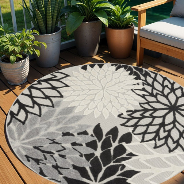 HomeRoots 5' Timeless Floral Indoor Outdoor Rug - Durable, Easy-Care, Versatile Accent for Any Space 5' Round Area Rug Black White 384599