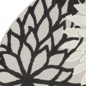 HomeRoots 5' Timeless Floral Indoor Outdoor Rug - Durable, Easy-Care, Versatile Accent for Any Space 5' Round Area Rug Black White 384599