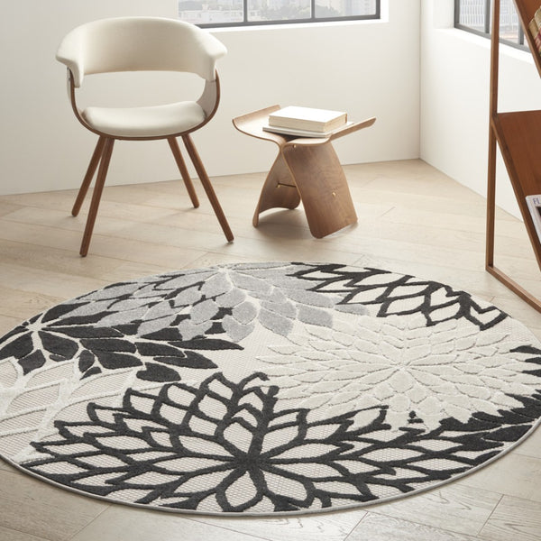 HomeRoots 5' Timeless Floral Indoor Outdoor Rug - Durable, Easy-Care, Versatile Accent for Any Space 5' Round Area Rug Black White 384599