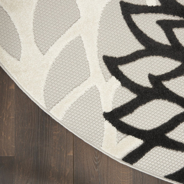 HomeRoots 5' Timeless Floral Indoor Outdoor Rug - Durable, Easy-Care, Versatile Accent for Any Space 5' Round Area Rug Black White 384599