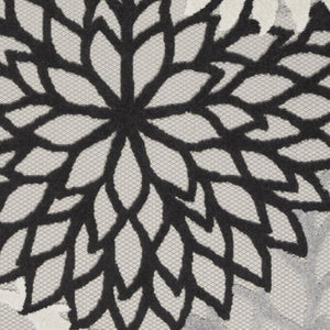 HomeRoots 5' Timeless Floral Indoor Outdoor Rug - Durable, Easy-Care, Versatile Accent for Any Space 6'x9' Area Rug Black White 384600