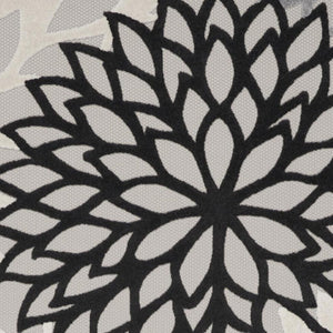 HomeRoots 5' Timeless Floral Indoor Outdoor Rug - Durable, Easy-Care, Versatile Accent for Any Space 7'x10' Area Rug Black White 384601