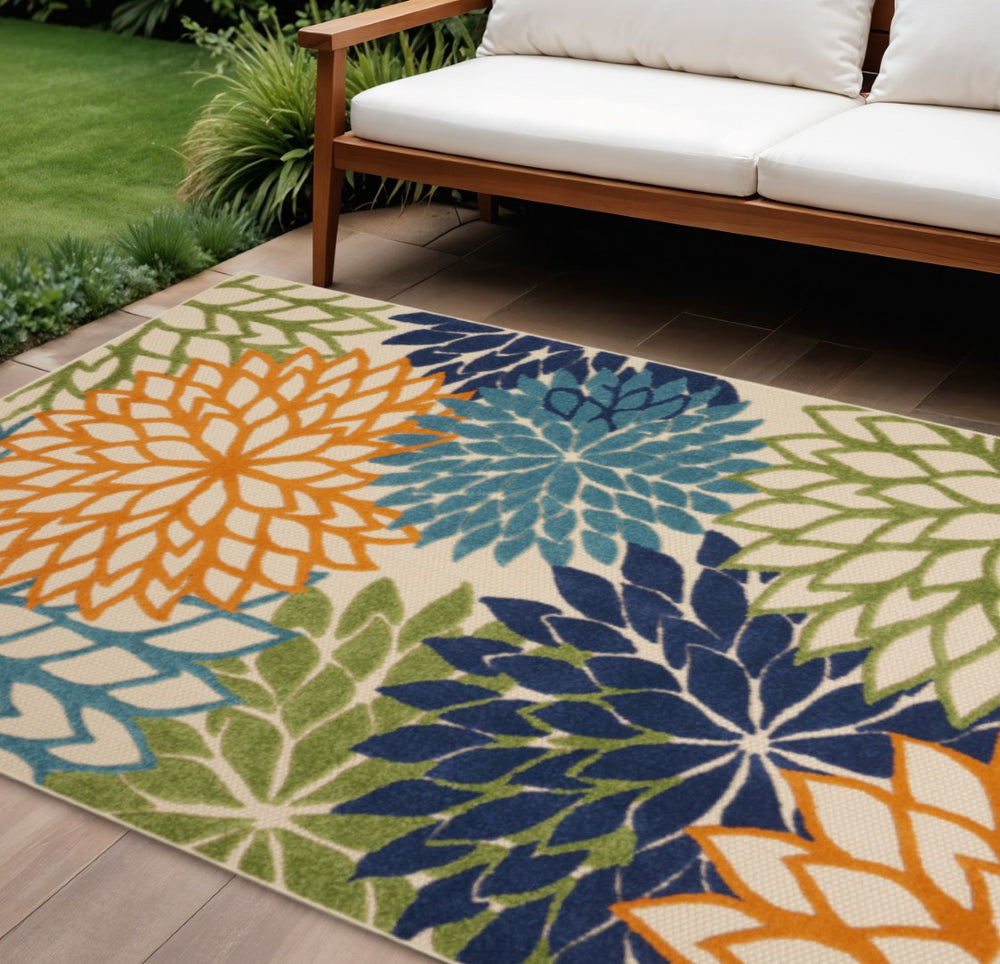 HomeRoots 6' Elegant Ivory and Blue Floral Area Rug for Indoor and Outdoor Spaces, Durable and Easy Care 6' x 9' 384640