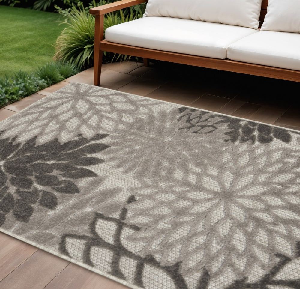 HomeRoots 5' Gray Floral Area Rug - Versatile Indoor/Outdoor Design for Stylish Spaces & High Traffic Areas 8'x11' Area Rug 384708