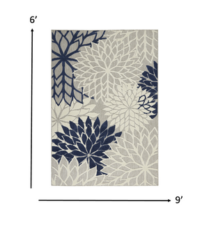 Homeroots 6' X 9' Ivory And Blue Floral Indoor Outdoor Area Rug Ivory Navy Polypropylene 384835