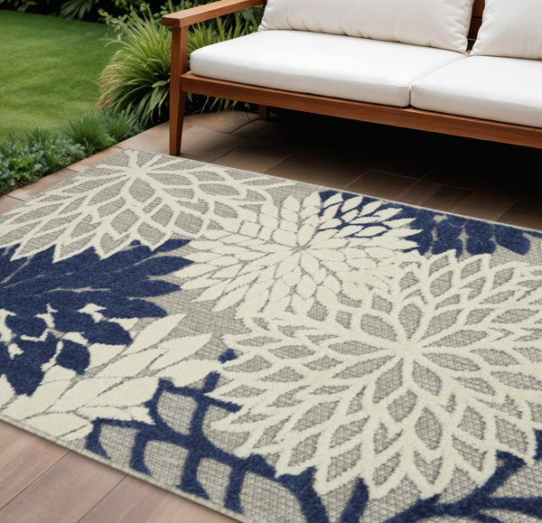 HomeRoots 5' Timeless Floral Indoor Outdoor Rug - Durable, Easy-Care, Versatile Accent for Any Space 7'x10' Area Rug Ivory Navy 384836