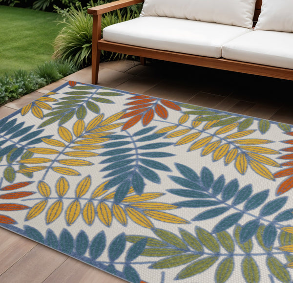 Homeroots 10' Ivory And Blue Floral Indoor Outdoor Area Rug - Perfect For Living Spaces, Patios, And More! 6' X 9' Polypropylene 384879