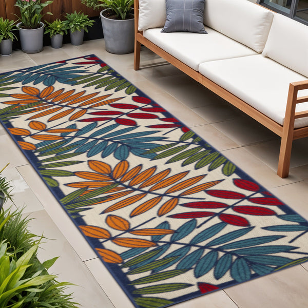 Homeroots 10' Ivory And Blue Floral Indoor Outdoor Area Rug - Perfect For Living Spaces, Patios, And More! 2?X 12? Runner Polypropylene 384938