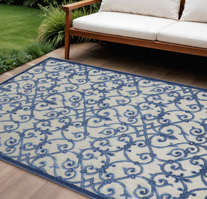 HomeRoots 8' Elegant Ivory and Blue Indoor Outdoor Area Rug with Timeless Floral Design for Any Space 8?x11? 385009