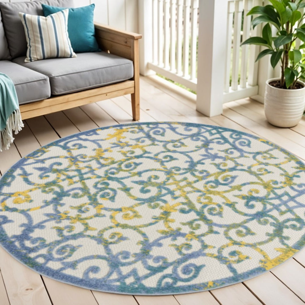 HomeRoots 5' Ivory and Blue Round Area Rug - Durable, Water-Resistant Design for Indoor and Outdoor Elegance 5? 385020